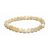 Elastisches Perlenarmband aus Naturmuschel, Kugel 6 mm / 16-17 cm, Symbol der Weiblichkeit