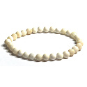 Elfenbeinfarbenes elastisches Armband aus natürlichem Elfenbein, Kugel 6 mm / 16 - 17 cm