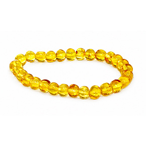 Bernstein Baltikum goldglänzend, natürliches elastisches Armband, unregelmäßiger Nugget ca. 5 mm / 16 - 17 cm, verfestigtes Sonnenlicht