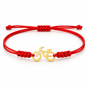 Die Kraft der Farben – Gemeinsam unterwegs – rotes Armband mit Fahrrad in Goldfarbe