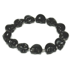 Magnesit / Howlit schwarz Totenkopf handgeschnitzt, Armband elastisch Naturstein 10 mm / 16 - 17 cm, Reinigungsstein
